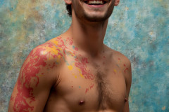Paint Splat Fun - Hot men having fun with body paint.