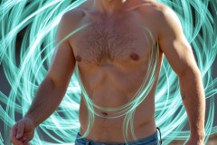 Photos of Handsome Shirtless Men Dancing with Light Rays,Colorful,in Motion.