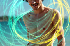 Photos of Handsome Shirtless Men Dancing with Light Rays,Colorful,in Motion.