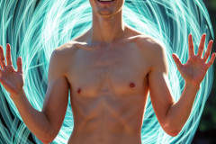 Photos of Handsome Shirtless Men Dancing with Light Rays,Colorful,in Motion.