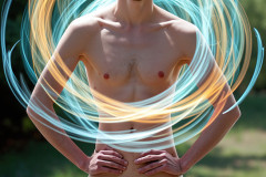 Photos of Handsome Shirtless Men Dancing with Light Rays,Colorful,in Motion.