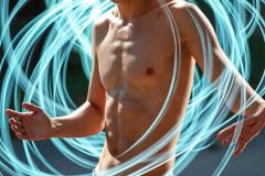 Photos of Handsome Shirtless Men Dancing with Light Rays,Colorful,in Motion.
