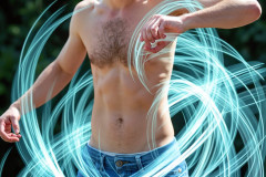 Photos of Handsome Shirtless Men Dancing with Light Rays,Colorful,in Motion.
