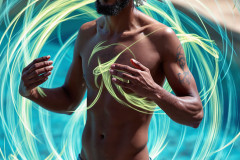 Photos of Handsome Shirtless Men Dancing with Light Rays,Colorful,in Motion.