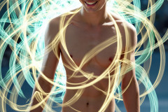Photos of Handsome Shirtless Men Dancing with Light Rays,Colorful,in Motion.