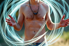 Photos of Handsome Shirtless Men Dancing with Light Rays,Colorful,in Motion.