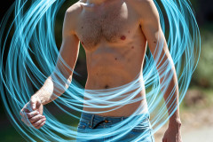 Photos of Handsome Shirtless Men Dancing with Light Rays,Colorful,in Motion.