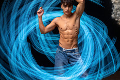Photos of Handsome Shirtless Men Dancing with Light Rays,Colorful,in Motion.