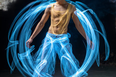 Photos of Handsome Shirtless Men Dancing with Light Rays,Colorful,in Motion.