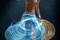 Photos of Handsome Shirtless Men Dancing with Light Rays,Colorful,in Motion.