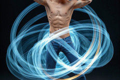 Photos of Handsome Shirtless Men Dancing with Light Rays,Colorful,in Motion.