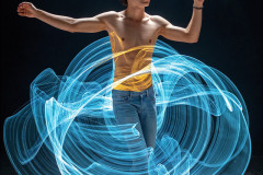 Photos of Handsome Shirtless Men Dancing with Light Rays,Colorful,in Motion.