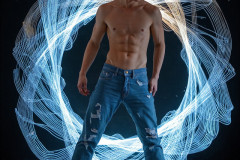 Photos of Handsome Shirtless Men Dancing with Light Rays,Colorful,in Motion.