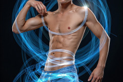 Photos of Handsome Shirtless Men Dancing with Light Rays,Colorful,in Motion.