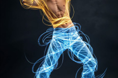 Photos of Handsome Shirtless Men Dancing with Light Rays,Colorful,in Motion.