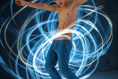Photos of Handsome Shirtless Men Dancing with Light Rays,Colorful,in Motion.