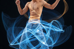 Photos of Handsome Shirtless Men Dancing with Light Rays,Colorful,in Motion.