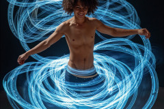 Photos of Handsome Shirtless Men Dancing with Light Rays,Colorful,in Motion.
