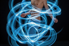 Photos of Handsome Shirtless Men Dancing with Light Rays,Colorful,in Motion.