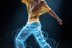 Photos of Handsome Shirtless Men Dancing with Light Rays,Colorful,in Motion.