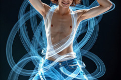 Photos of Handsome Shirtless Men Dancing with Light Rays,Colorful,in Motion.