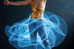 Photos of Handsome Shirtless Men Dancing with Light Rays,Colorful,in Motion.