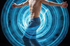 Photos of Handsome Shirtless Men Dancing with Light Rays,Colorful,in Motion.