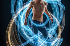 Photos of Handsome Shirtless Men Dancing with Light Rays,Colorful,in Motion.