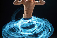 Photos of Handsome Shirtless Men Dancing with Light Rays,Colorful,in Motion.