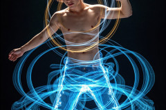 Photos of Handsome Shirtless Men Dancing with Light Rays,Colorful,in Motion.