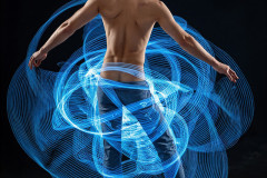 Photos of Handsome Shirtless Men Dancing with Light Rays,Colorful,in Motion.