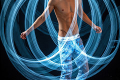 Photos of Handsome Shirtless Men Dancing with Light Rays,Colorful,in Motion.