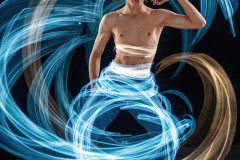 Photos of Handsome Shirtless Men Dancing with Light Rays,Colorful,in Motion.