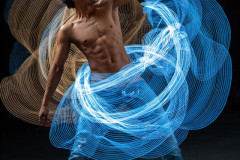 Photos of Handsome Shirtless Men Dancing with Light Rays,Colorful,in Motion.