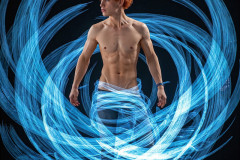 Photos of Handsome Shirtless Men Dancing with Light Rays,Colorful,in Motion.