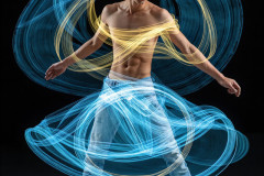 Photos of Handsome Shirtless Men Dancing with Light Rays,Colorful,in Motion.
