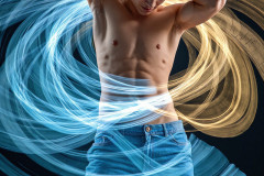 Photos of Handsome Shirtless Men Dancing with Light Rays,Colorful,in Motion.