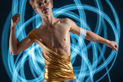 Photos of Handsome Shirtless Men Dancing with Light Rays,Colorful,in Motion.