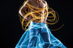 Photos of Handsome Shirtless Men Dancing with Light Rays,Colorful,in Motion.