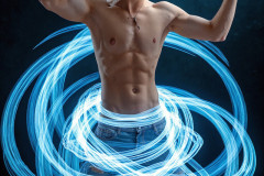 Photos of Handsome Shirtless Men Dancing with Light Rays,Colorful,in Motion.