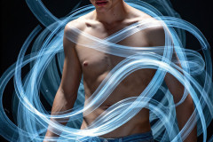 Photos of Handsome Shirtless Men Dancing with Light Rays,Colorful,in Motion.
