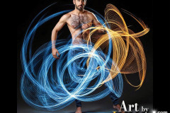 Photos of Handsome Shirtless Men Dancing with Light Rays,Colorful,in Motion.