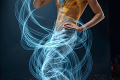 Photos of Handsome Shirtless Men Dancing with Light Rays,Colorful,in Motion.
