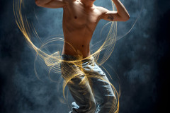 Photos of Handsome Shirtless Men Dancing with Light Rays,Colorful,in Motion.