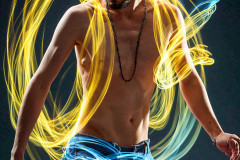 Photos of Handsome Shirtless Men Dancing with Light Rays,Colorful,in Motion.