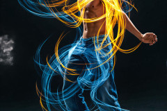 Photos of Handsome Shirtless Men Dancing with Light Rays,Colorful,in Motion.
