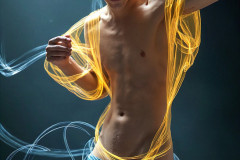 Photos of Handsome Shirtless Men Dancing with Light Rays,Colorful,in Motion.
