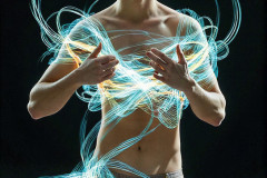 Photos of Handsome Shirtless Men Dancing with Light Rays,Colorful,in Motion.