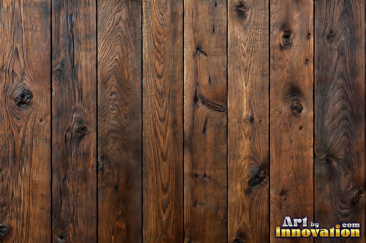 Vertical barn boards in oxblood red stain with every knot showing through