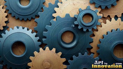 On a wooden workshop table, blue toothed metal wheels interlock with brass cogs